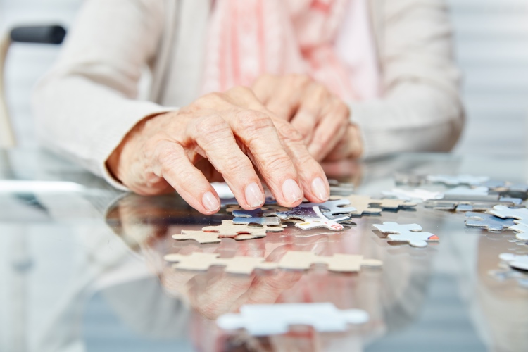 old woman with puzzle